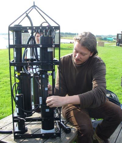 Dr. J Hedley with the underwater spectroscopy instrument suite
